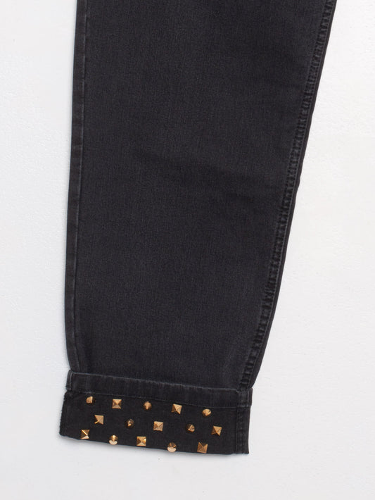 Jeans with studs at the bottom