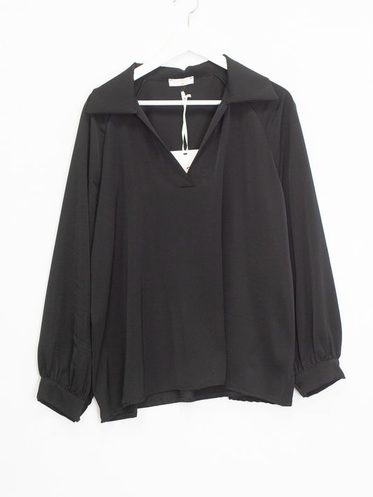 Blusa scoll V colletto