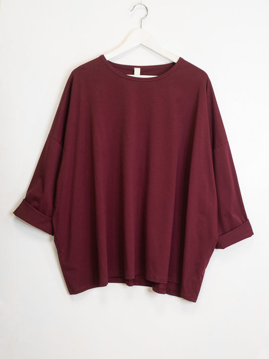 Oversized cotton T-shirt with even bottom
