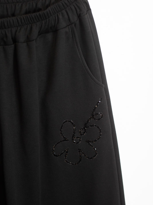 Pantalone soft fiori pailettes