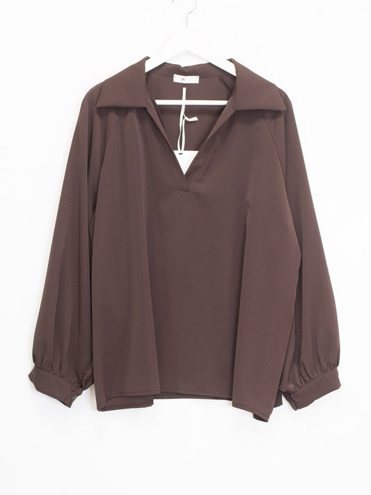 Blusa scoll V colletto