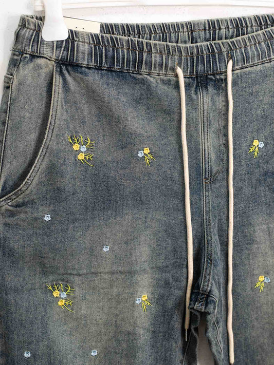 Elasticated jeans with embroidery